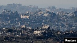 Buildings lie in ruin in the Gaza Strip, amid the ongoing conflict between Israel and Hamas, as seen from southern Israel, Jan. 2, 2025.