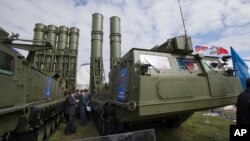 FILE - The Russian air defense missile system Antey 2500, or S-300 VM, is on display at the opening of the MAKS Air Show in Zhukovsky outside Moscow, Russia, Aug. 27, 2013. The Russian military said Tuesday it had deployed the S-300 air defense missile systems to Syria to protect a Russian navy facility in the Syrian port of Tartus and Russian navy ships in the area.