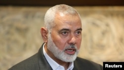 FILE - Palestinian group Hamas' top leader, Ismail Haniyeh, is shown in this June 28, 2021, photo. China's Foreign Ministry said diplomat Wang Kejian met with Haniyeh March 17, 2024, in Qatar to discuss the conflict in Gaza.