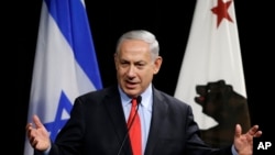 Israeli Prime Minister Benjamin Netanyahu gestures while speaking in Mountain View, California, March 5, 2014.