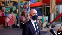 Secretary of Homeland Security Alejandro Mayorkas speaks with the media outside of the Little Haiti Cultural Center, May 25, 2021, in Miami. 
