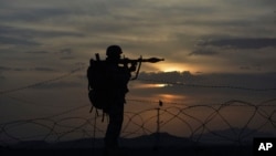 A Pakistani border security guard stands alert at Pakistan-Afghanistan border post, Chaman in Pakistan, May 5, 2017. The U.S. recently decided to withhold $50 million in military aid to Pakistan for failing to do enough against the Haqqani network.