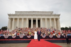 President Donald Trump and first lady Melania Trump arrive at an Independence Day celebration in front of the Lincoln Memorial, Thursday, July 4, 2019, in Washington.