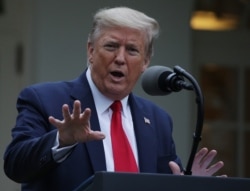 FILE - President Donald Trump speaks during the daily briefing of the White House Coronavirus Task Force in the Rose Garden at the White House, April 14, 2020, in Washington, when he announced he would be halting WHO funding from the U.S.