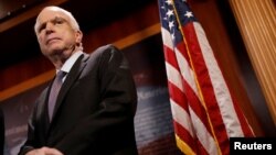 FILE - Senator John McCain (R-Az.) looks on during a press conference about his resistance to the so-called "Skinny Repeal" of the Affordable Care Act on Capitol Hill in Washington, July 27, 2017.