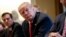 FILE - President Donald Trump listens during a meeting with steel and aluminum executives in the Cabinet Room of the White House in Washington, March 1, 2018.