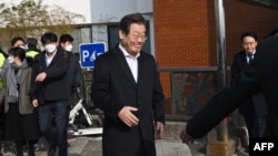 South Korean opposition leader Lee Jae-myung leaves the Seoul National University Hospital in Seoul on Jan. 10, 2024.