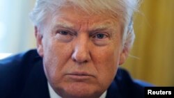 U.S. President Donald Trump sits for an interview with Reuters in the Oval Office at the White House in Washington, Feb. 23, 2017. 