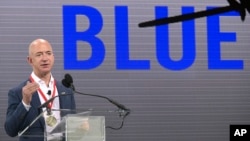 Amazon CEO Jeff Bezos addresses reporters and guests during a news conference unveiling the new Blue Origin rocket at the Cape Canaveral Air Force Station in Cape Canaveral, Fla., Sept. 15, 2015.