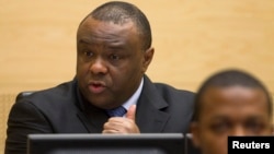 Jean-Pierre Bemba, a former vice president of the Democratic Republic of Congo, speaks at the opening of his trial in The Hague, Nov. 22, 2010. 