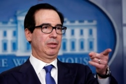 FILE - Treasury Secretary Steven Mnuchin speaks about the coronavirus at the White House, April 13, 2020.