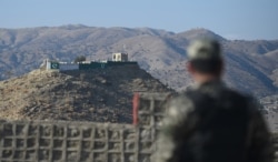 FILE - A Pakistani army soldier stands guard on a border terminal in Ghulam Khan, a town in North Waziristan, on the border between Pakistan and Afghanistan, Jan. 27, 2019. (AFP)
