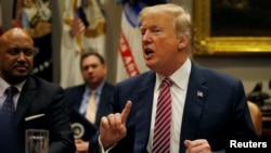 U.S. President Donald Trump talks about gun safety in schools during a meeting with local and state officials about improving school safety at the White House in Washington, Feb. 22, 2018.