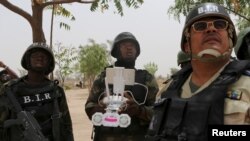 FILE - Cameroonian soldiers operate a surveillance drone at their base in Achigachia, Cameroon, March 16, 2016. An 8,700-strong regional force is seeking to stamp out Boko Haram.