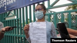Ley Leak, a former deputy from the dissolved Cambodia National Rescue Party, arrives at the court for the treason trial of more than 100 opposition figures, in Phnom Penh, Cambodia, Nov. 26, 2020. 