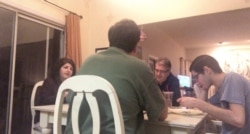 During quarantine, the Mekouar family sits down for a family dinner every night. (Dora Mekouar/VOA)