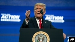 FILE - President Donald Trump speaks to a group of young Republicans at Dream City Church in Phoenix, June 23, 2020.