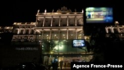 A camera stands in front of the Coburg Palais, venue of the Joint Comprehensive Plan of Action (JCPOA) during a meeting aiming at reviving the Iran nuclear deal, in Vienna, Austria, Dec. 27, 2021.