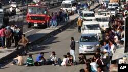 People block Chandigarh Shimla highway in Panchkula in Haryana state, India, Feb. 21, 2016, as thousands of members of an underprivileged community in northern India continue to protest to demand government benefits and jobs