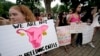 FILE - Abortion-rights advocates gather outside a the Kansas Statehouse to protest the U.S. Supreme Court's ruling on abortion, June 24, 2022, in Topeka, Kan. 