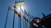 FILE - The Ukrainian flag, top, flies with other European flags outside the European Parliament, July 5, 2022, in Strasbourg, France.