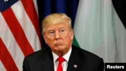 U.S. President Donald Trump looks up during his meeting with Palestinian President Mahmoud Abbas during the U.N. General Assembly in New York, Sept. 20, 2017.
