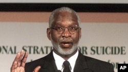 Surgeon General David Satcher meets reporters in Washington, May 2, 2001.