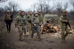 Ukraine's President Volodymyr Zelenskiy visits positions of armed forces near the frontline with Russian-backed separatists during his working trip in Donbass region, Ukraine April 8, 2021.
