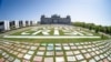 Activists of the Fridays for Future movement place protest posters for climate protection in front the German parliament building, the Reichstag, in Berlin, Germany, April 24, 2020. 
