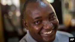 Gambian President-elect Adama Barrow sits for an interview with the Associated Press at his residence in Yundum, Gambia, Dec. 3, 2016.