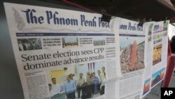 Local newspapers the Phnom Penh Post, left, and Khmer Times, right, are for sale at a newspaper's stand on a sidewalk near Monument Independence in Phnom Penh, Cambodia, Friday, Mach 1, 2024.