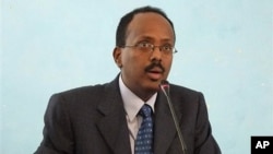 Somali Prime Minister Mohamed Abdullahi Mohamed addresses officials after his swearing in ceremony at the Presidential residence in Mogadishu, Somalia, 01 Nov 2010