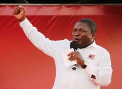 Ruling Frelimo Party leader and President Filipe Nyusi, speaks at an election rally in Maputo, Mozambique, Oct. 12, 2019.