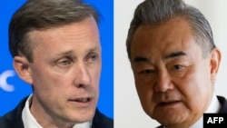 资料照：美国白宫国安顾问沙利文（左）与中共中央政治局委员、外交部长王毅