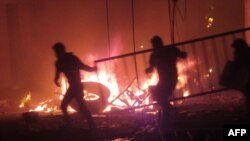 Bolivian opposition protestors set on fire the electoral offices in Sucre on October 21, 2019. Mesa, the main rival of Bolivia's President Evo Morales, refuses to recognize the election results. 