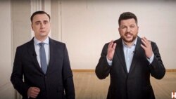 FILE - In this image taken from a video released by Alexei Navalny Youtube Channel on April 18, 2021, Leonid Volkov, a top strategist for Navalny, right, and his colleague Ivan Zhdanov record their address from somewhere in Europe.