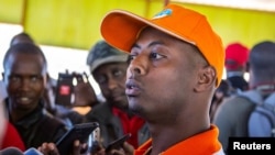 FILE - Rwandan singer Kizito Mihigo talks to reporters in Kigali, Rwanda, Sept. 15, 2018. 