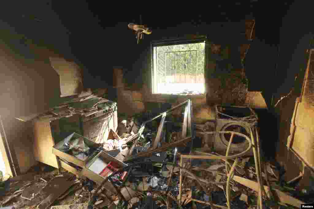An interior view of the damage at the U.S. consulate, which was attacked and set on fire by gunmen yesterday, in Benghazi, Libya, September 12, 2012. 