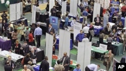 Job seekers pack the aisles of a Career Fair at Cleveland State University (March 2011 file photo)