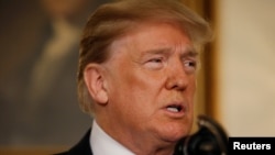 U.S. President Donald Trump speaks about the mass shooting at a Florida high school in a national address from the White House in Washington, Feb. 15, 2018.