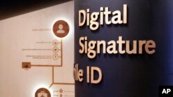 This photo taken on Thursday, Nov. 15 2018, shows an exhibition in Tallinn presenting Estonia's digital achievements. (AP Photo/David Keyton)