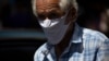 A man wears a homemade face mask as a preventive measure against the spread of the new coronavirus in Caracas, Venezuela, March 26, 2020.