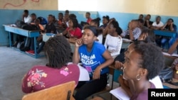 Students attend a class at the College Saint Pierre-Eglise Episcopale D'Haiti as schools and businesses tentatively reopen their doors as anti-government protests wane, in Port-au-Prince, Haiti, Dec. 3, 2019.