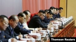 North Korean leader Kim Jong Un attends the first day of the 8th Congress of the Workers' Party in Pyongyang, North Korea, in this photo supplied by North Korea's Central News Agency (KCNA) on January 6, 2021.