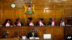 Kenyan Supreme Court judges preside over the hearing of petitions challenging President Uhuru Kenyatta's reelection in a repeat presidential poll, in Nairobi, Kenya, Nov. 14, 2017.