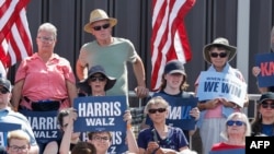 The crowd listens as U.S. vice president and 2024 Democratic presidential candidate Kamala Harris speaks during a campaign rally in Eau Claire, Wisconsin, Aug. 7, 2024.
