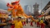 FILE - Traditional dragon dances are performed at a temple during the eve of Nine Emperor Gods festival in Kuala Lumpur, Malaysia, Oct. 2, 2024.