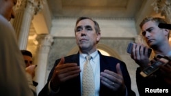 FILE - Senator Jeff Merkley, a Democrat, speaks to reporters on Capitol Hill, in Washington, April 5, 2017. 