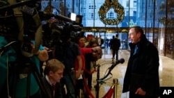 Former CIA director retired Gen. David Petraeus talks with reporters at Trump Tower after a meeting with President-elect Donald Trump, Nov. 28, 2016, in New York.