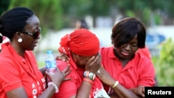 FILE - Security issues are expected to dominate the African Union Summit. As more Nigerian towns come under attack by Boko Haram, '#Bring Back Our Girls' campaigners show support for the missing Chibok schoolgirls at a rally in Abuja, Nov. 3, 2014. 